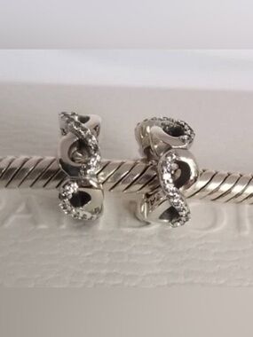 2 Pandora Infinite Love spacer charm featuring a sterling silver